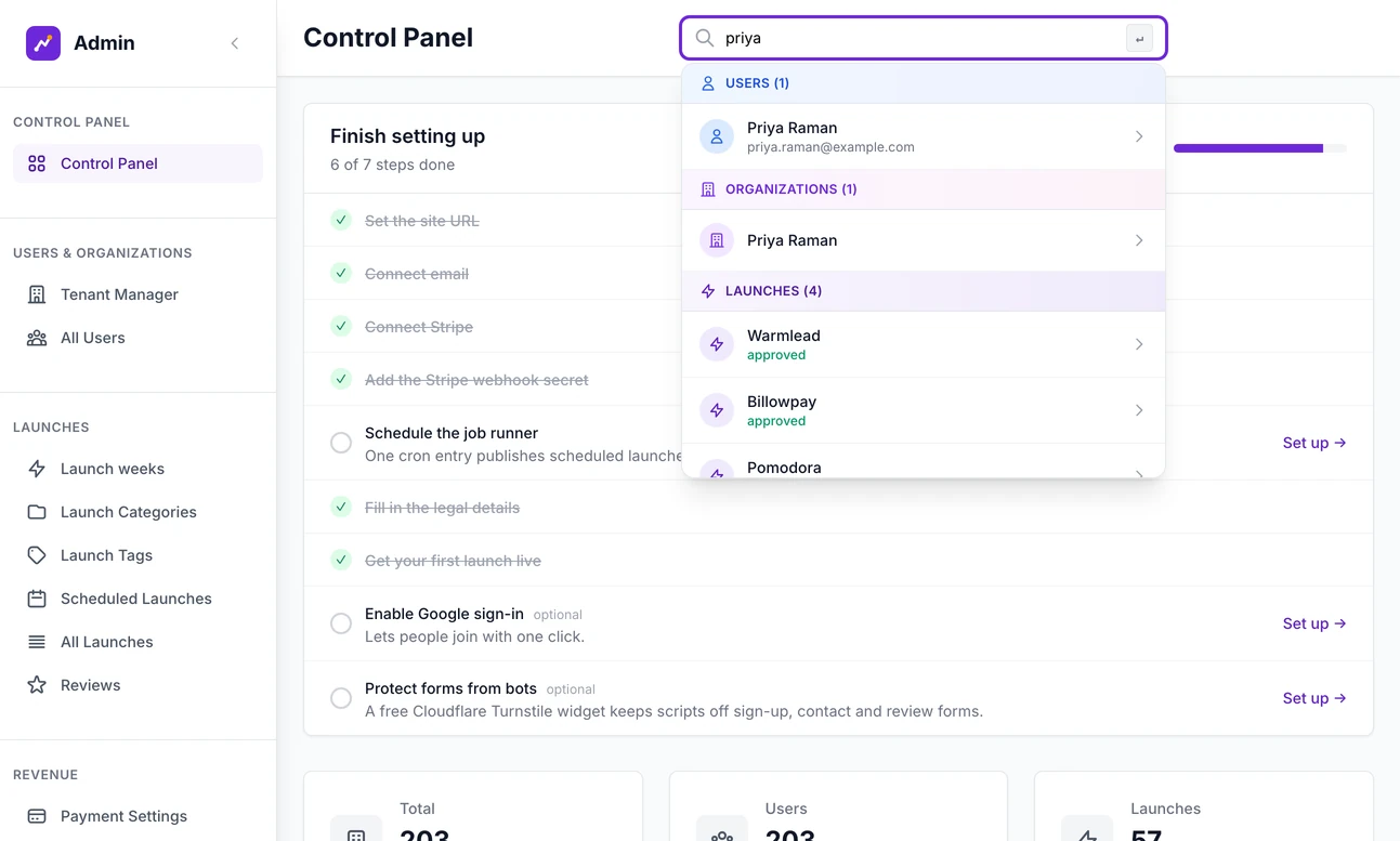 The admin search box with a name typed in and its results open underneath, grouped under Users, Organizations and Launches, each result a link